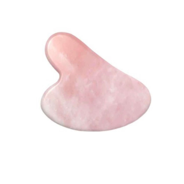 Heart Shaped Rose Quartz Gua Sha Stone on a white background