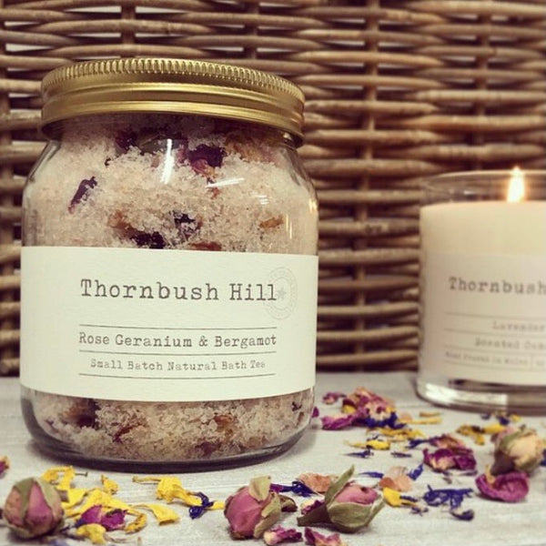 Thornbush Hill vegan Rose Geranium, Bergamot & Eucalyptus Bath Tea on a decorative background