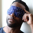 Image of a male wearing a relaxing Lavender Scented self heating eye mask from Sensory Retreats