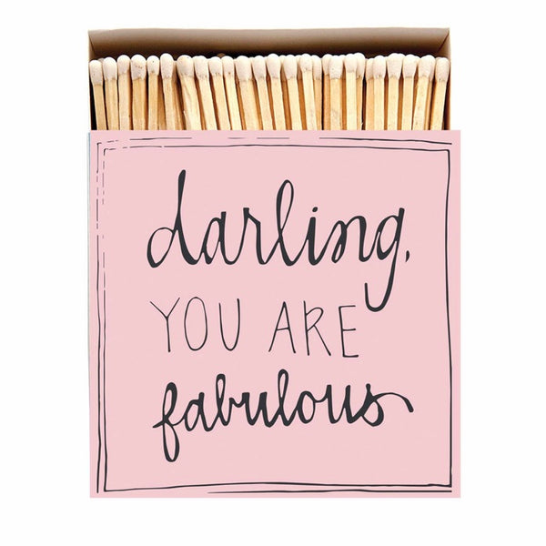 Pale pink box of long luxury matches from the Archivist printed with the words - darling you are fabulous - contains approx 125 matches