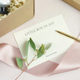 Little Box of Joy Branded Notecard taken on a cream background