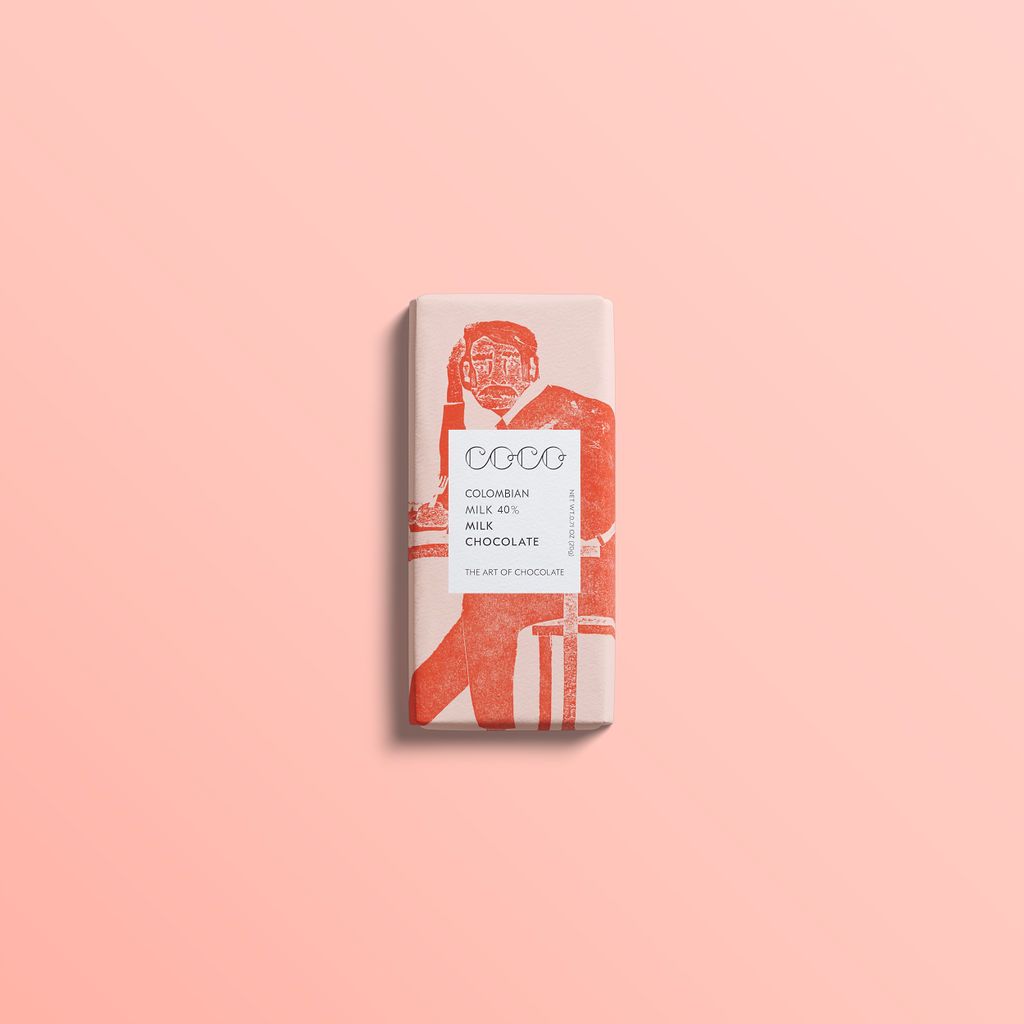 Colombian Milk Chocolate mini bar from Coco Chocolatier 20g on a pink background